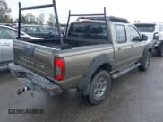 ✅ 2002 Nissan Frontier XE • VIN: 1N6ED27T72C391796 • Lot: 43758517. Listed on IAAI with 122,559 mi. Free auction sales archive from the USA and detailed vehicle history report at DreamBid. Image 4.