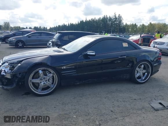 ✅ 2005 Mercedes-Benz SL 55 AMG • VIN: WDBSK74F65F099663 • Lot: 43377046. Listed on IAAI with 31,050 mi. Free auction sales archive from the USA and detailed vehicle history report at DreamBid. Image 15.