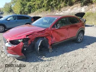✅ 2022 Mazda CX-30 S Preferred • VIN: 3MVDMBCL0NM451665 • Лот: 80352415. Опубликован ранее на Copart с пробегом 22 090 миль. Бесплатный доступ к архиву аукционных продаж из США и подробный отчёт об истории автомобиля на DreamBid. Изображение 1.