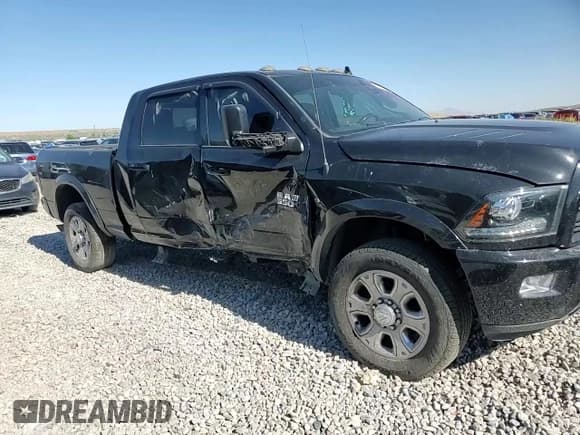 ✅ 2018 Ram 3500 Laramie • VIN: 3C63R3ML5JG164325 • Lot: 63039965. Wystawiony na Copart z przebiegiem 96 689 mil. Bezpłatny archiwum sprzedaży aukcyjnych z USA i szczegółowy raport historii pojazdu na DreamBid. Zdjęcie 13.