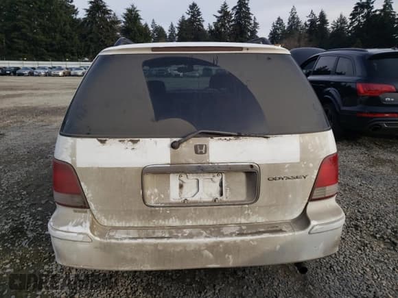 ✅ 1998 Honda Odyssey • VIN: RA31038664 • Lot: 43051785. Listed on Copart with 106,084 mi. Free auction sales archive from the USA and detailed vehicle history report at DreamBid. Image 6.