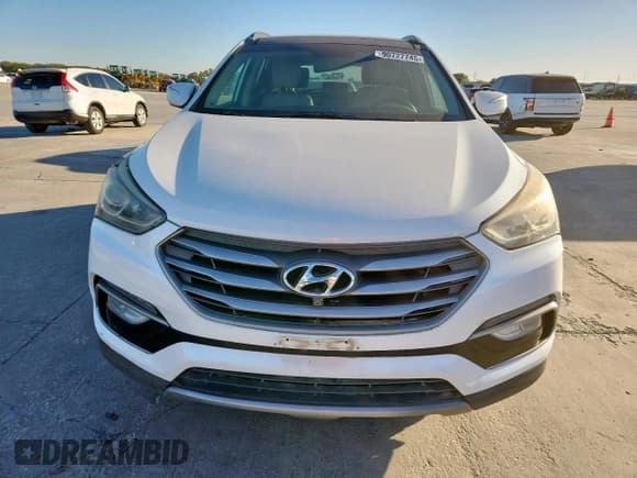 ✅ 2017 Hyundai Santa Fe 2.4L • VIN: 5XYZU3LB8HG410979 • Lot: 90727745. Wystawiony na Copart z przebiegiem 89 970 mil. Bezpłatny archiwum sprzedaży aukcyjnych z USA i szczegółowy raport historii pojazdu na DreamBid. Zdjęcie 5.