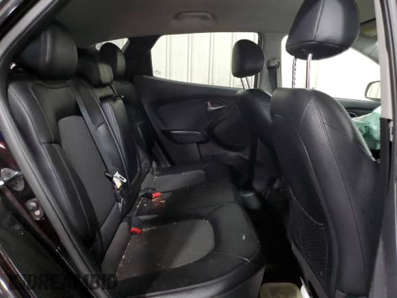 2014 Hyundai Tucson SE z VIN KM8JUCAG8EU828394, wystawiony jako Copart lot #63650005 z przebiegiem 141 656 mil mil oraz Szkoda całkowita • Salvage title. Historia ofert i sprzedaży dostępna na DreamBid. Obrazek 11.