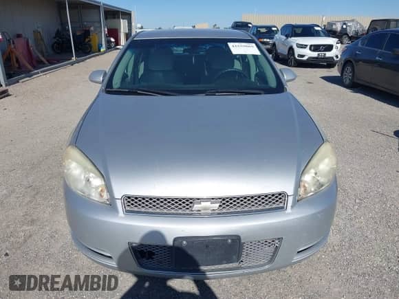 2013 Chevrolet Impala LS z VIN 2G1WF5E35D1265220, wystawiony jako IAAI lot #42559869 z przebiegiem 124 046 mil mil oraz . Historia ofert i sprzedaży dostępna na DreamBid. Obrazek 12.