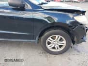 ✅ 2012 Hyundai Santa Fe GLS • VIN: 5XYZGDAB1CG100634 • Lot: 43607374. Listed on IAAI with 178,389 mi. Free auction sales archive from the USA and detailed vehicle history report at DreamBid. Image 15.