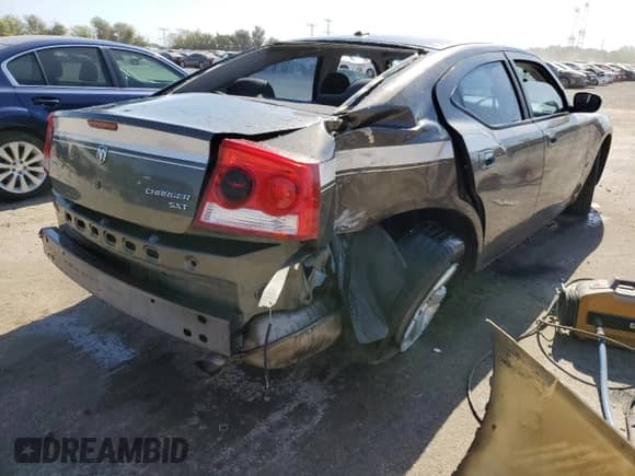 2010 Dodge Charger SXT с VIN 2B3CA3CV8AH106682, выставлен на аукционе Copart как лот 73697774 с пробегом 139 044 миль миль и Списание • Salvage title. История ставок и продаж доступна на DreamBid. Изображение 3.