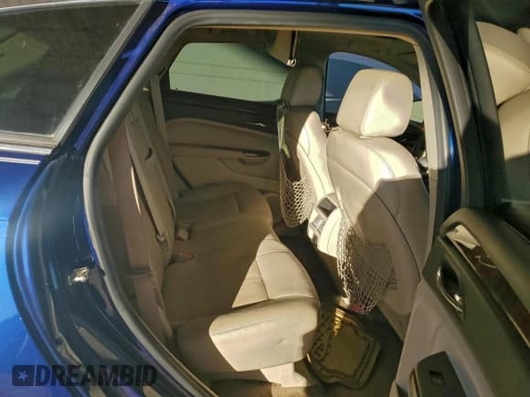 ✅ 2012 Cadillac SRX Luxury Collection • VIN: 3GYFNAE39CS571885 • Lot: 95023075. Wystawiony na Copart z przebiegiem 20 760 mil. Bezpłatny archiwum sprzedaży aukcyjnych z USA i szczegółowy raport historii pojazdu na DreamBid. Zdjęcie 10.