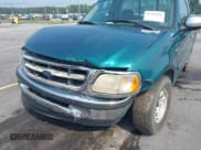 ✅ 1998 Ford F-150 XL • VIN: 1FTRF17L1WNC30511 • Lot: 42365469. Wystawiony na IAAI z przebiegiem 287 691 mil. Bezpłatny archiwum sprzedaży aukcyjnych z USA i szczegółowy raport historii pojazdu na DreamBid. Zdjęcie 6.