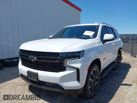 2023 Chevrolet Tahoe RST z VIN 1GNSKRKL7PR524774, wystawiony jako IAAI lot #42086221 z przebiegiem 38 124 mil mil oraz . Historia ofert i sprzedaży dostępna na DreamBid. Obrazek 2.
