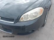 ✅ 2014 Chevrolet Impala LTZ • VIN: 2G1WC5E3XE1189956 • Lot: 43718567. Listed on IAAI with 142,559 mi. Free auction sales archive from the USA and detailed vehicle history report at DreamBid. Image 19.