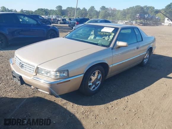 ✅ 1997 Cadillac Eldorado • VIN: 1G6EL12Y4VU602876 • Lot: 43239613. Listed on IAAI with 79,117 mi. Free auction sales archive from the USA and detailed vehicle history report at DreamBid. Image 2.