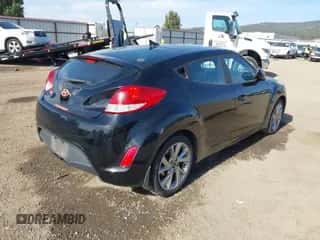2016 Hyundai Veloster z VIN KMHTC6AD1GU292457, wystawiony jako IAAI lot #43419828 z przebiegiem 105 746 mil mil oraz . Historia ofert i sprzedaży dostępna na DreamBid. Obrazek 4.