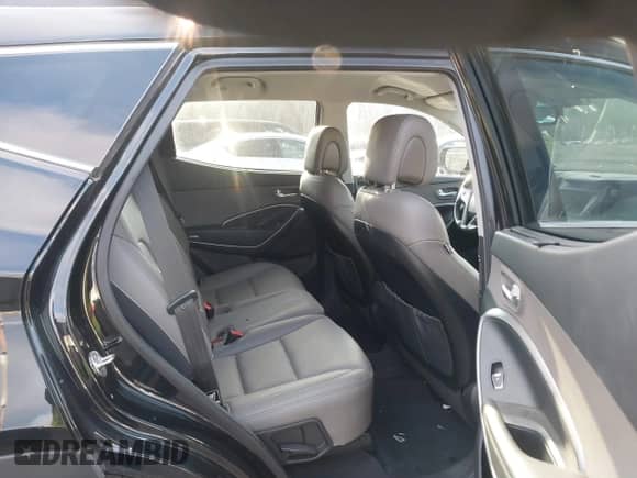 2017 Hyundai Santa Fe 2.0T z VIN 5XYZUDLA8HG502333, wystawiony jako IAAI lot #41246195 z przebiegiem 62 772 mil mil oraz . Historia ofert i sprzedaży dostępna na DreamBid. Obrazek 8.