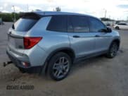 ✅ 2022 Honda Passport EX-L • VIN: 5FNYF8H52NB023630 • Lot: 67558733. Wystawiony na Copart z przebiegiem Nie podano. Bezpłatny archiwum sprzedaży aukcyjnych z USA i szczegółowy raport historii pojazdu na DreamBid. Zdjęcie 3.