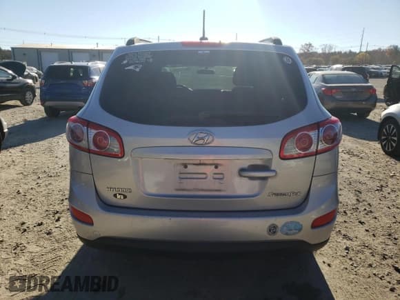 ✅ 2012 Hyundai Santa Fe GLS • VIN: 5XYZGDAB1CG162535 • Lot: 79842324. Listed on Copart with 174,959 mi. Free auction sales archive from the USA and detailed vehicle history report at DreamBid. Image 6.