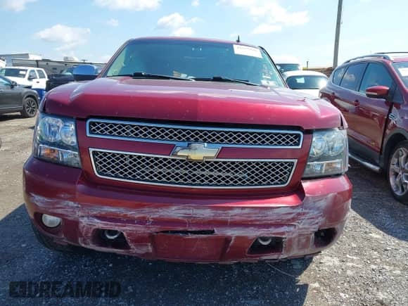 2011 Chevrolet Tahoe LTZ with VIN 1GNSKCE0XBR158736, listed as a IAAI auction lot 42355880 with 288,518 mi miles and . Bid and sale history available at DreamBid. Image 12.