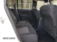 ✅ 2014 Jeep Patriot Latitude • VIN: 1C4NJPFB1ED889282 • Lot: 52318265. Listed on Copart with 122,271 mi. Free auction sales archive from the USA and detailed vehicle history report at DreamBid. Image 11.