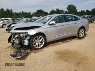 2020 Chevrolet Impala Premier z VIN 1G1105S36LU111165, wystawiony jako Copart lot #67045685 z przebiegiem 103 503 mil mil oraz Szkoda całkowita • Salvage title. Historia ofert i sprzedaży dostępna na DreamBid. Obrazek 1.