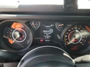 ✅ 2025 Jeep Wrangler Sport • VIN: 1C4PJXAN2SW576316 • Lot: 60550635. Listed on Copart with 1,730 mi. Free auction sales archive from the USA and detailed vehicle history report at DreamBid. Image 9.