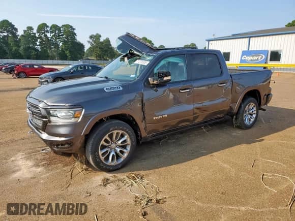 2022 Ram 1500 Laramie with VIN 1C6RREJT7NN124433, listed as a Copart auction lot 71278305 with 41,030 mi miles and Salvage title. Bid and sale history available at DreamBid. Image 1.