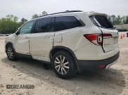 ✅ 2019 Honda Pilot EX-L • VIN: 5FNYF5H4XKB022940 • Lot: 52860545. Listed on Copart with Not provided. Free auction sales archive from the USA and detailed vehicle history report at DreamBid. Image 2.