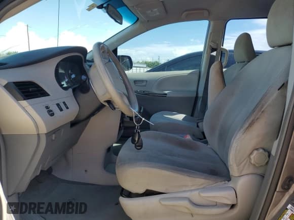 ✅ 2012 Toyota Sienna • VIN: 5TDZK3DC7CS249517 • Lot: 82555775. Listed on Copart with 168,897 mi. Free auction sales archive from the USA and detailed vehicle history report at DreamBid. Image 7.