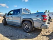 ✅ 2024 Nissan Frontier Pro-X • VIN: 1N6ED1EJ0RN674759 • Lot: 90909865. Listed on Copart with 5,392 mi. Free auction sales archive from the USA and detailed vehicle history report at DreamBid. Image 2.