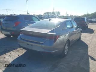 ✅ 2021 Hyundai Elantra SE • VIN: KMHLL4AG1MU155061 • Lot: 43382329. Listed on IAAI with 73,780 mi. Free auction sales archive from the USA and detailed vehicle history report at DreamBid. Image 4.