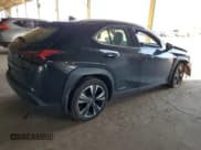✅ 2021 Lexus UX 250h • VIN: JTHP9JBH7M2052361 • Лот: 80718545. Опубликован ранее на Copart с пробегом 83 813 миль. Бесплатный доступ к архиву аукционных продаж из США и подробный отчёт об истории автомобиля на DreamBid. Изображение 3.