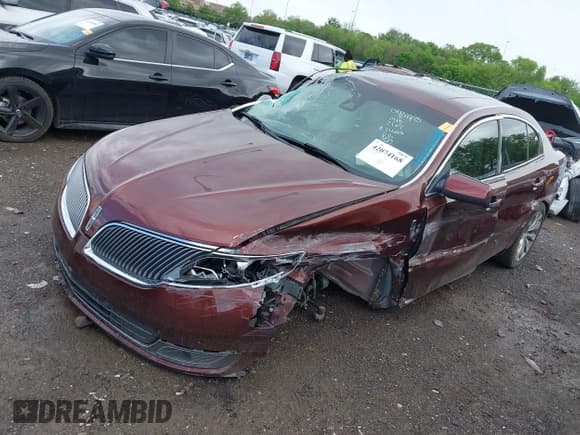 ✅ 2015 Lincoln MKS • VIN: 1LNHL9DK7FG602187 • Lot: 42074168. Wystawiony na IAAI z przebiegiem 175 042 mil. Bezpłatny archiwum sprzedaży aukcyjnych z USA i szczegółowy raport historii pojazdu na DreamBid. Zdjęcie 6.