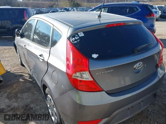 ✅ 2013 Hyundai Accent GS • VIN: KMHCT5AE9DU123205 • Lot: 43864921. Listed on IAAI with 197,257 mi. Free auction sales archive from the USA and detailed vehicle history report at DreamBid. Image 3.
