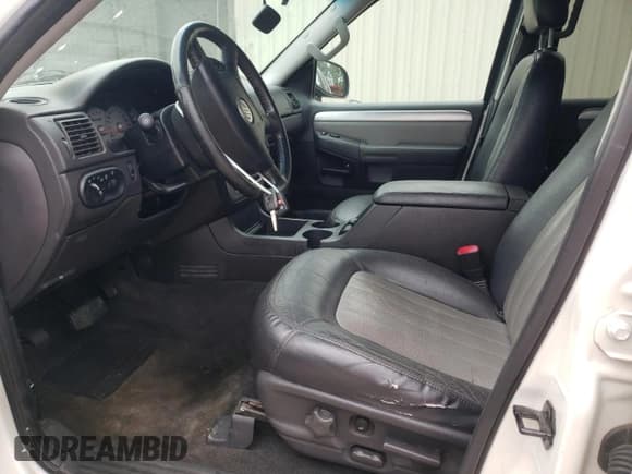 ✅ 2004 Mercury Mountaineer Convenience • VIN: 4M2DU86W74ZJ35391 • Лот: 67538475. Опубликован ранее на Copart с пробегом 174 196 миль. Бесплатный доступ к архиву аукционных продаж из США и подробный отчёт об истории автомобиля на DreamBid. Изображение 7.