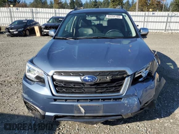 2018 Subaru Forester Touring with VIN JF2SJAWC4JH533194, listed as a Copart auction lot 85264165 with 115,027 mi miles and Salvage title. Bid and sale history available at DreamBid. Image 5.