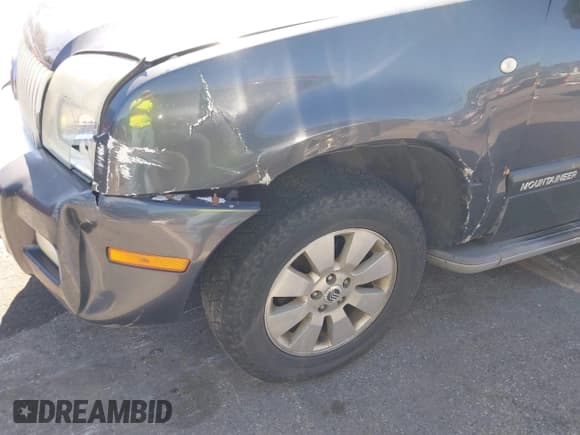 ✅ 2010 Mercury Mountaineer • VIN: 4M2EN4HE3AUJ05862 • Lot: 43187846. Wystawiony na IAAI z przebiegiem 178 978 mil. Bezpłatny archiwum sprzedaży aukcyjnych z USA i szczegółowy raport historii pojazdu na DreamBid. Zdjęcie 6.