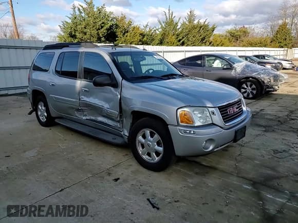 ✅ 2005 GMC Envoy SLT • VIN: 1GKET16S456194696 • Lot: 92130285. Listed on Copart with 201,153 mi. Free auction sales archive from the USA and detailed vehicle history report at DreamBid. Image 14.