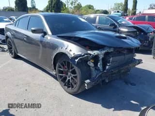 2020 Dodge Charger Scat Pack with VIN 2C3CDXGJ7LH183040, listed as a IAAI auction lot 41965465 with 74,912 mi miles and . Bid and sale history available at DreamBid. Image 1.