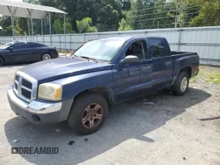 ✅ 2005 Dodge Dakota SLT • VIN: 1D7HE48K85S138825 • Лот: 66740035. Опубликован ранее на Copart с пробегом 247 989 миль. Бесплатный доступ к архиву аукционных продаж из США и подробный отчёт об истории автомобиля на DreamBid. Изображение 1.