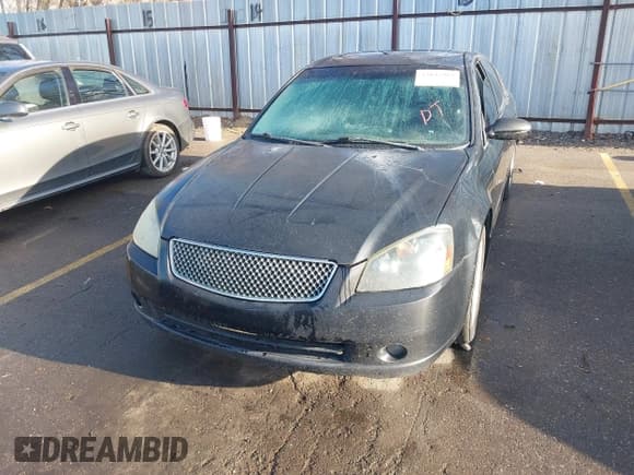 ✅ 2005 Nissan Altima SE • VIN: 1N4BL11E95C171163 • Лот: 43835991. Опубликован ранее на IAAI с пробегом 255 410 миль. Бесплатный доступ к архиву аукционных продаж из США и подробный отчёт об истории автомобиля на DreamBid. Изображение 6.