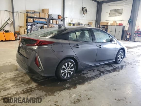 ✅ 2021 Toyota Prius XLE • VIN: JTDKAMFP6M3174970 • Lot: 85478855. Listed on Copart with 69,387 mi. Free auction sales archive from the USA and detailed vehicle history report at DreamBid. Image 3.