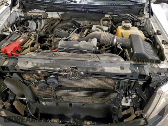 ✅ 2013 Ford F-150 XL • VIN: 1FTEX1EM2DKG33824 • Лот: 94451315. Опубликован ранее на Copart с пробегом 216 350 миль. Бесплатный доступ к архиву аукционных продаж из США и подробный отчёт об истории автомобиля на DreamBid. Изображение 11.