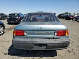✅ 1993 Toyota Tercel Std • VIN: JT2EL46S4P0318249 • Lot: 69345874. Wystawiony na Copart z przebiegiem 167 199 mil. Bezpłatny archiwum sprzedaży aukcyjnych z USA i szczegółowy raport historii pojazdu na DreamBid. Zdjęcie 6.