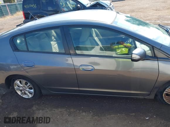✅ 2011 Honda Insight EX • VIN: JHMZE2H74BS005777 • Lot: 43217504. Wystawiony na IAAI z przebiegiem 211 541 mil. Bezpłatny archiwum sprzedaży aukcyjnych z USA i szczegółowy raport historii pojazdu na DreamBid. Zdjęcie 13.