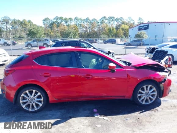 ✅ 2014 Mazda 3 S Grand Touring • VIN: JM1BM1M30E1101998 • Lot: 43651277. Listed on IAAI with 215,319 mi. Free auction sales archive from the USA and detailed vehicle history report at DreamBid. Image 13.