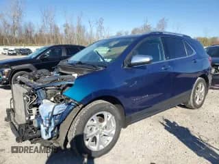 2020 Chevrolet Equinox Premier z VIN 2GNAXXEV0L6121661, wystawiony jako Copart lot #90585015 z przebiegiem 80 147 mil mil oraz Szkoda całkowita • Salvage title. Historia ofert i sprzedaży dostępna na DreamBid. Obrazek 1.