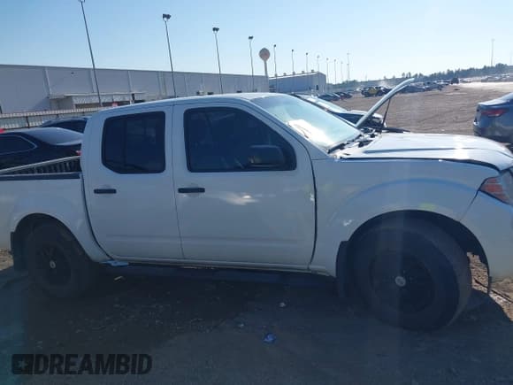 ✅ 2021 Nissan Frontier SV • VIN: 1N6ED0EA6MN701496 • Lot: 43144366. Listed on IAAI with 81,457 mi. Free auction sales archive from the USA and detailed vehicle history report at DreamBid. Image 13.