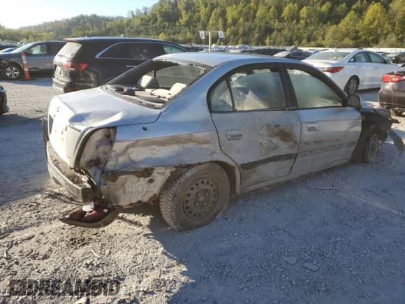 2002 Hyundai Elantra GLS z VIN KMHDN45D62U305242, wystawiony jako Copart lot #74677914 z przebiegiem 151 933 mil mil oraz Szkoda całkowita • Salvage title. Historia ofert i sprzedaży dostępna na DreamBid. Obrazek 3.