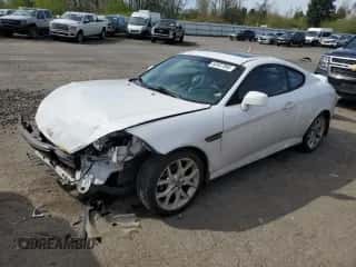 2008 Hyundai Tiburon GT z VIN KMHHN66F28U290373, wystawiony jako Copart lot #52407995 z przebiegiem 134 751 mil mil oraz Szkoda całkowita • Salvage title. Historia ofert i sprzedaży dostępna na DreamBid. Obrazek 1.