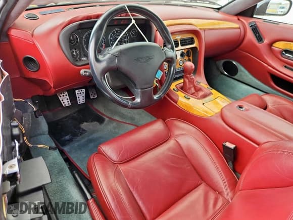 ✅ 2003 Aston Martin Vantage • VIN: SCFAB42353K403530 • Lot: 80822495. Wystawiony na Copart z przebiegiem 35 275 mil. Bezpłatny archiwum sprzedaży aukcyjnych z USA i szczegółowy raport historii pojazdu na DreamBid. Zdjęcie 8.