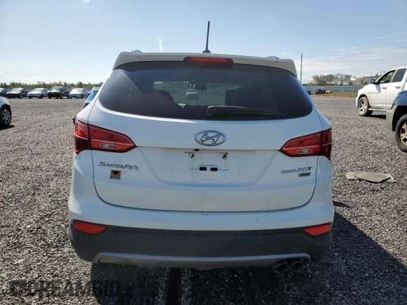 ✅ 2015 Hyundai Santa Fe Limited • VIN: 5XYZUDLA2FG258207 • Lot: 68584043. Listed on Copart with 214,993 mi. Free auction sales archive from the USA and detailed vehicle history report at DreamBid. Image 6.