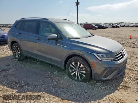 ✅ 2022 Volkswagen Tiguan S • VIN: 3VV1B7AXXNM146463 • Лот: 71870245. Опубликован ранее на Copart с пробегом 80 088 миль. Бесплатный доступ к архиву аукционных продаж из США и подробный отчёт об истории автомобиля на DreamBid. Изображение 4.
